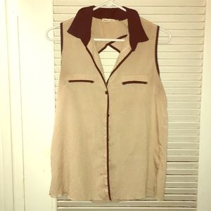 Keyhole back chiffon style shirt.